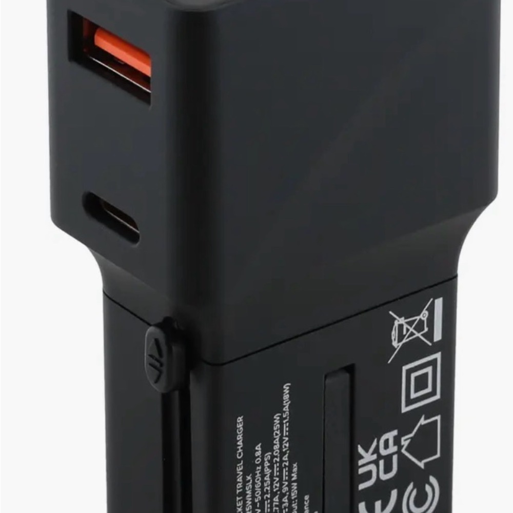 TUMI Travel Bundle Adapter Charger 1 USB port/1 C port- both US/international ad